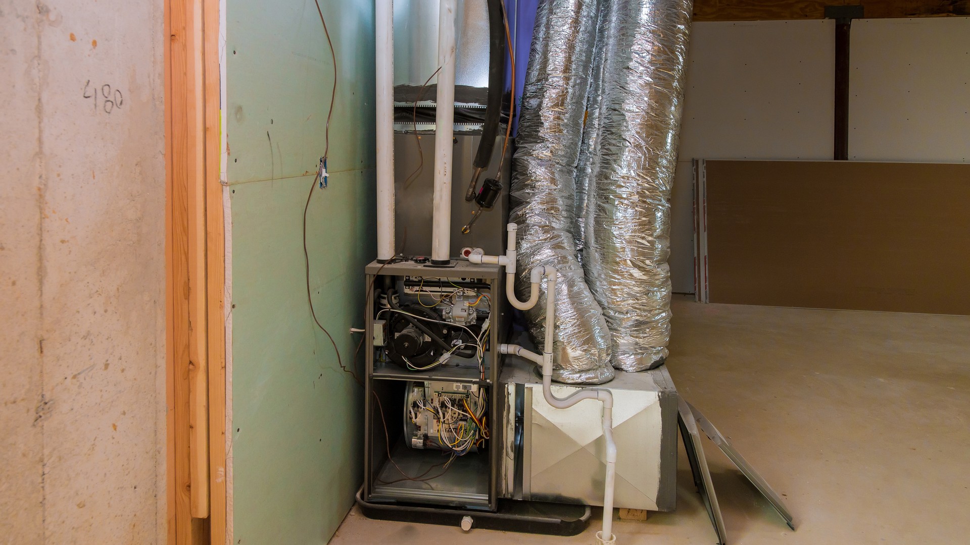 Furnace and ductwork in an unfinished basement